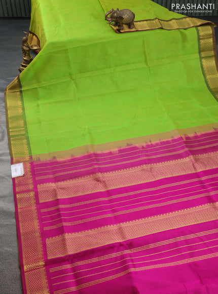 Silk cotton saree light green and magenta pink with allover self emboss jacquard and zari woven border