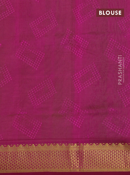 Silk cotton saree light green and magenta pink with allover self emboss jacquard and zari woven border
