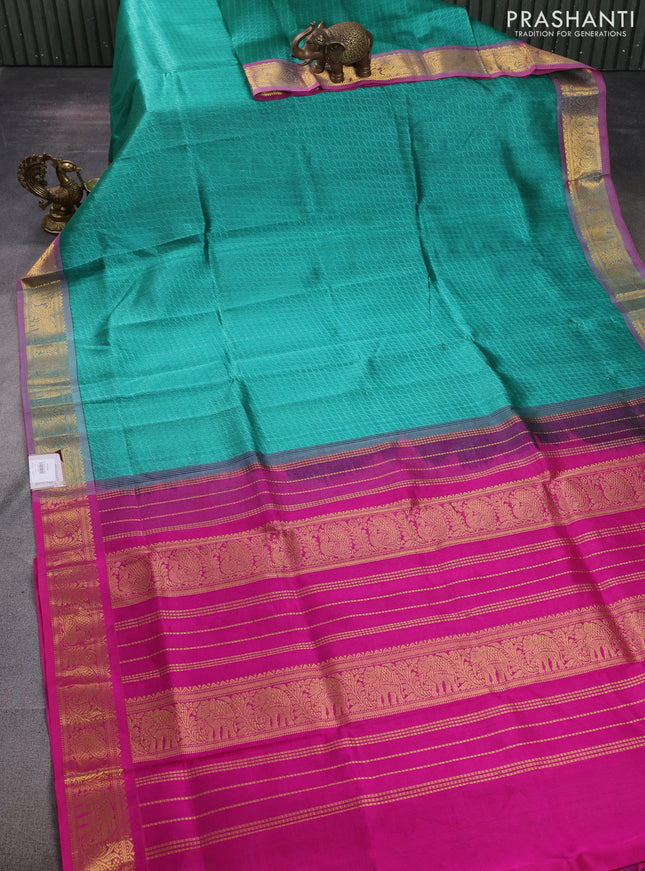 Silk cotton saree teal green and pink with allover self emboss jacquard and annam zari woven border