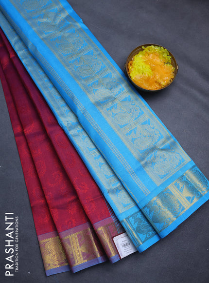 Silk cotton saree maroon and cs blue with allover self emboss jacquard and annam zari woven border