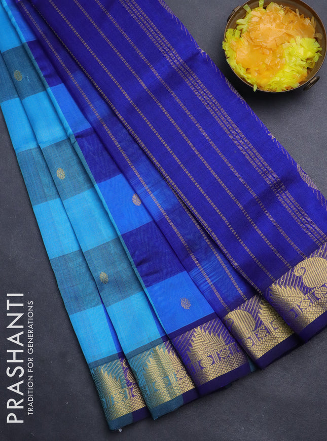Silk cotton saree light blue and dark blue with allover paalum pazhamum checks & zari buttas and paisley & temple zari woven border