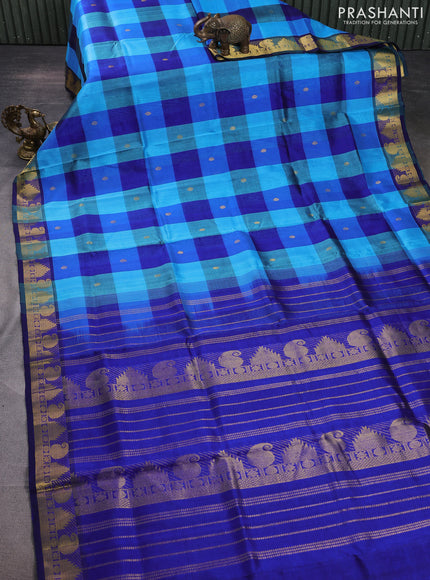Silk cotton saree light blue and dark blue with allover paalum pazhamum checks & zari buttas and paisley & temple zari woven border