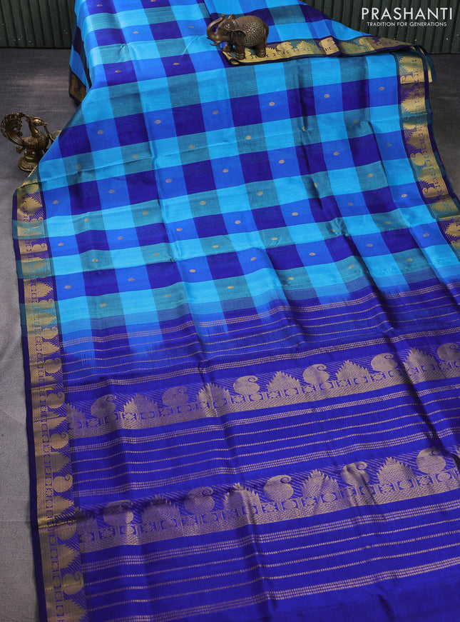 Silk cotton saree light blue and dark blue with allover paalum pazhamum checks & zari buttas and paisley & temple zari woven border