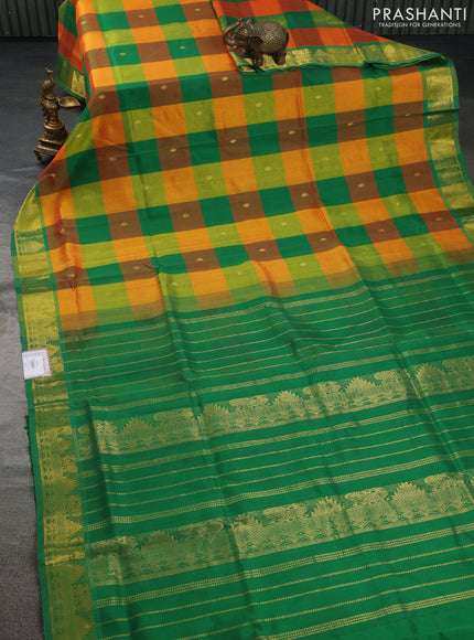 Silk cotton saree orange and green with allover paalum pazhamum checks & zari buttas and annam zari woven border