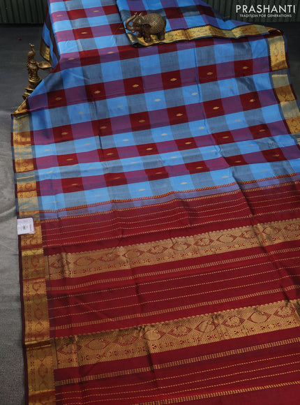 Silk cotton saree pastel blue and maroon with allover paalum pazhamum checks & zari buttas and zari woven border