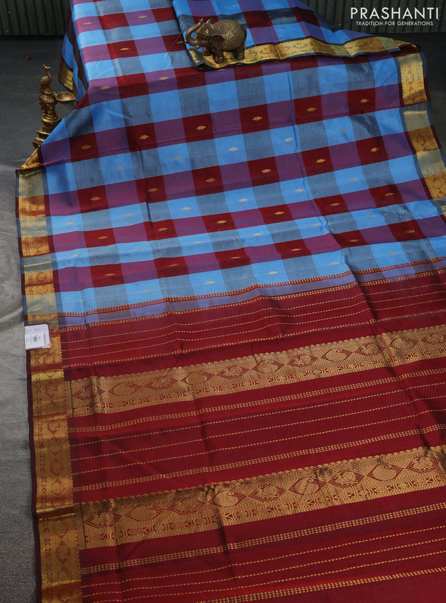 Silk cotton saree pastel blue and maroon with allover paalum pazhamum checks & zari buttas and zari woven border