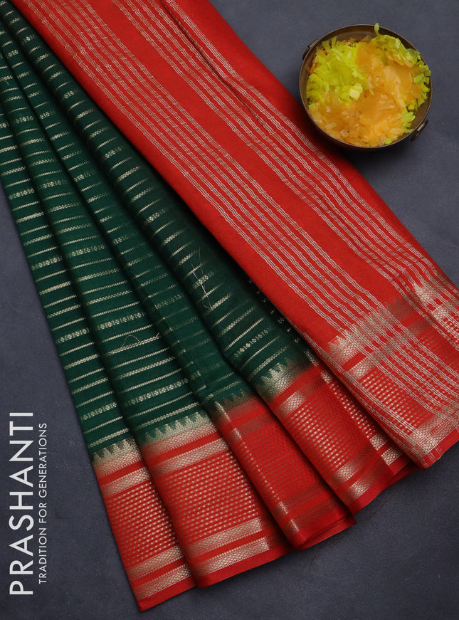 Semi mysore silk saree bottle green and orange with allover zari weaves and zari woven border