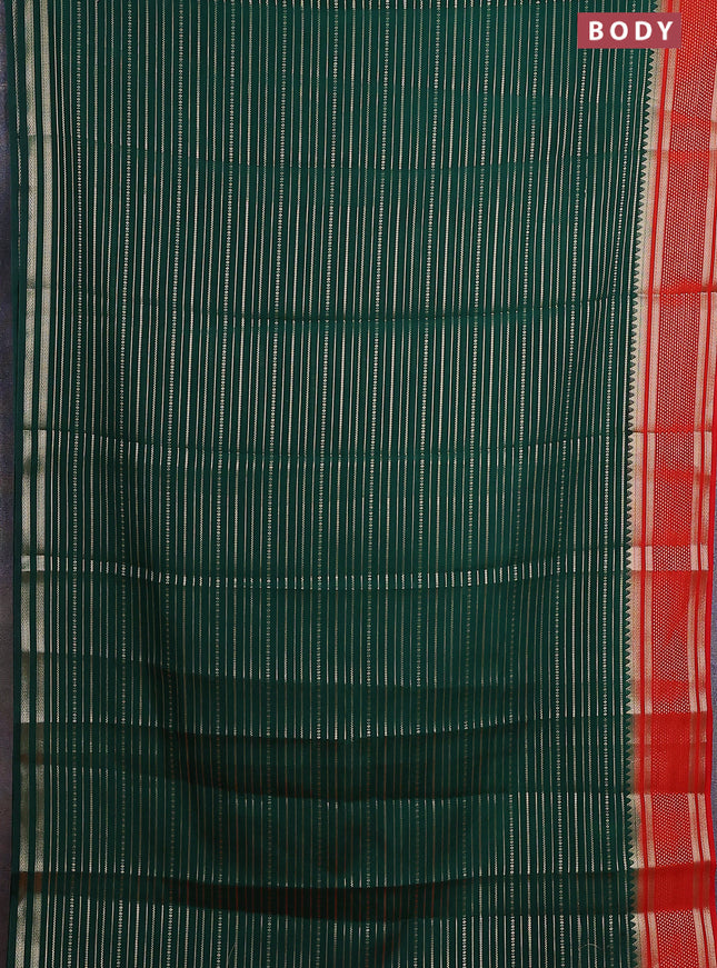 Semi mysore silk saree bottle green and orange with allover zari weaves and zari woven border