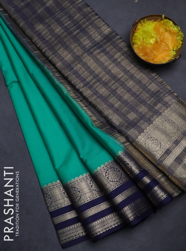 Semi mysore silk saree teal green and navy blue with plain body and zari woven border