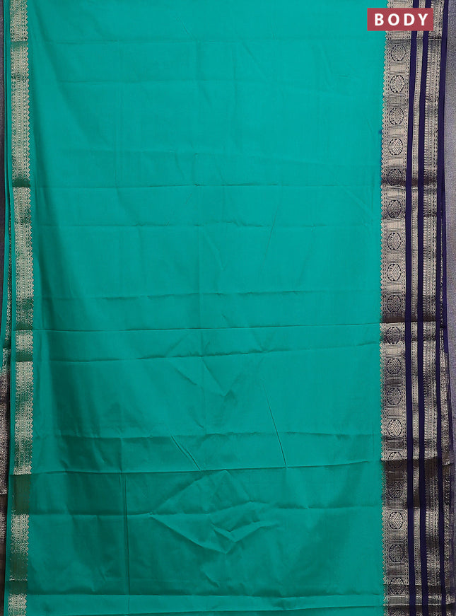 Semi mysore silk saree teal green and navy blue with plain body and zari woven border