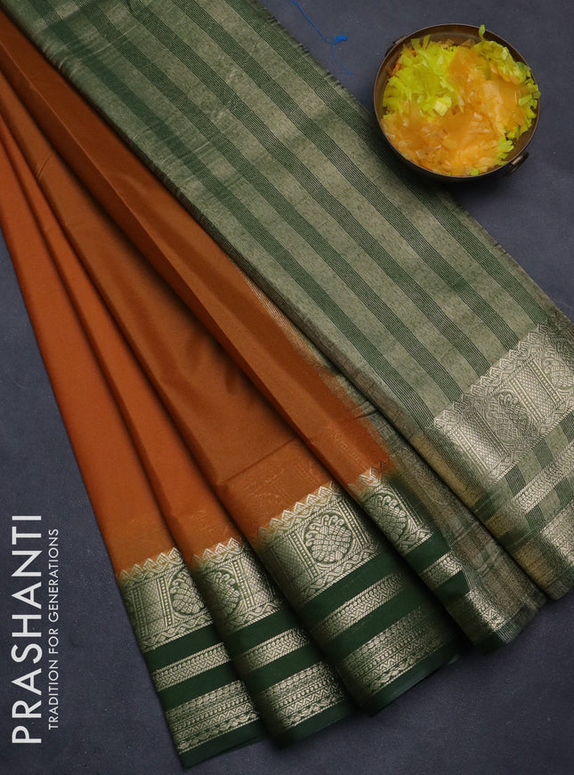 Semi mysore silk saree dark mustard and sap green with plain body and zari woven border