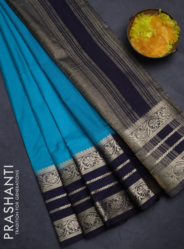 Semi mysore silk saree teal blue and navy blue with plain body and zari woven border