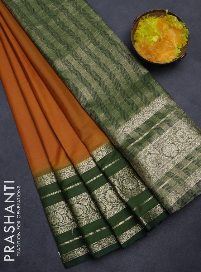 Semi mysore silk saree dark mustard and sap green with plain body and long zari woven border