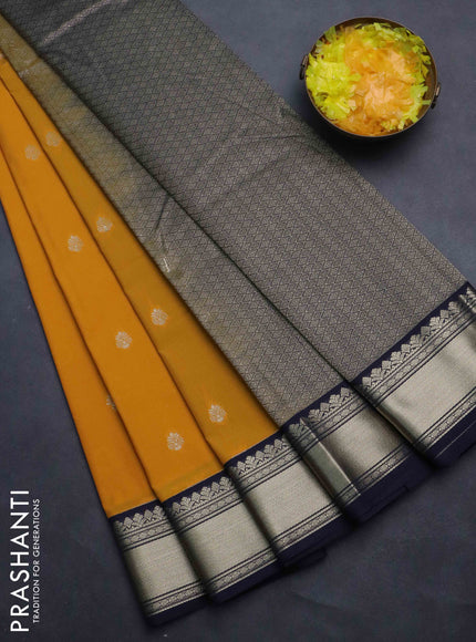 Semi kanchipuram silk saree dark mustard and navy blue with zari woven buttas and zari woven korvai border