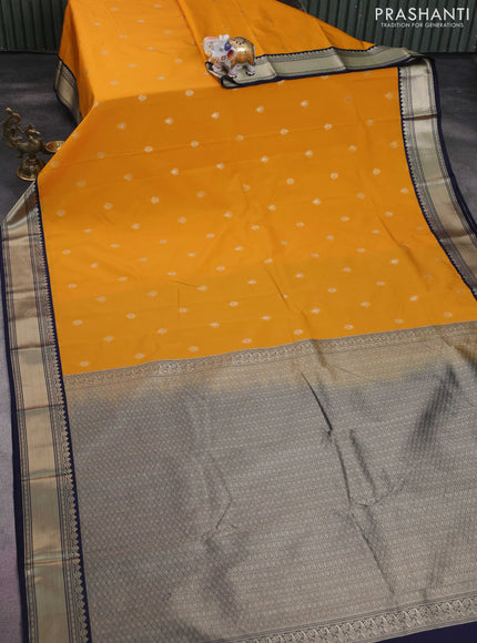Semi kanchipuram silk saree dark mustard and navy blue with zari woven buttas and zari woven korvai border