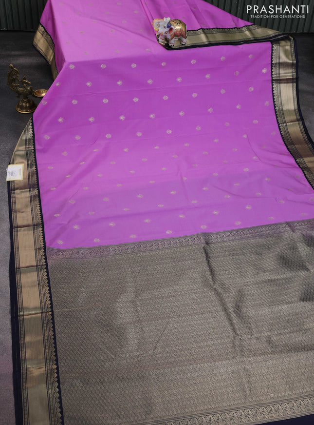 Semi kanchipuram silk saree lavender and navy blue with zari woven buttas and zari woven korvai border
