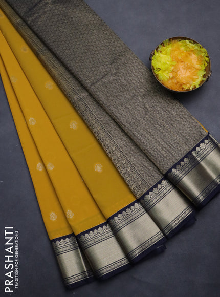 Semi kanchipuram silk saree mustard yellow and navy blue with zari woven buttas and zari woven korvai border