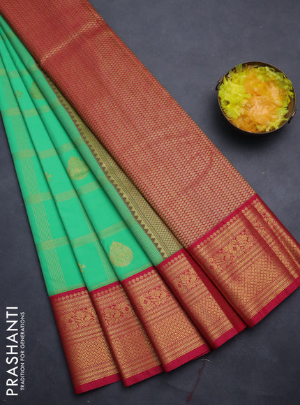 Semi kanchipuram silk saree teal green and pink with allover zari checks & buttas and rich zari woven korvai border
