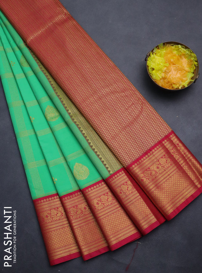 Semi kanchipuram silk saree teal green and pink with allover zari checks & buttas and rich zari woven korvai border