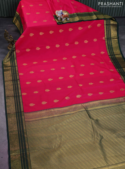 Semi kanchipuram silk saree pink and dark green with zari woven floral buttas and zari woven korvai border