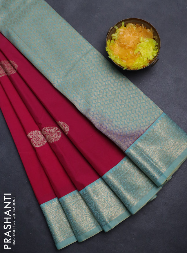 Semi kanchipuram silk saree pink and teal blue shade with paisley zari woven buttas and rich zari woven border