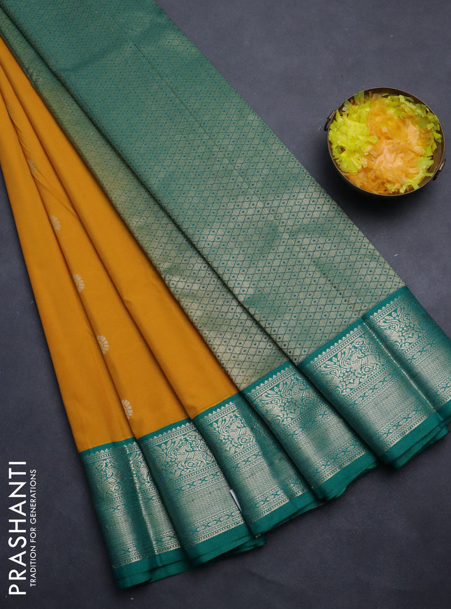 Semi kanchipuram silk saree mango yellow and teal green with zari woven buttas and rich zari woven korvai border
