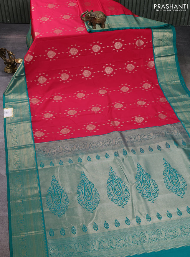 Semi kanchipuram silk saree reddish pink and teal green with allover zari woven buttas and zari woven korvai border