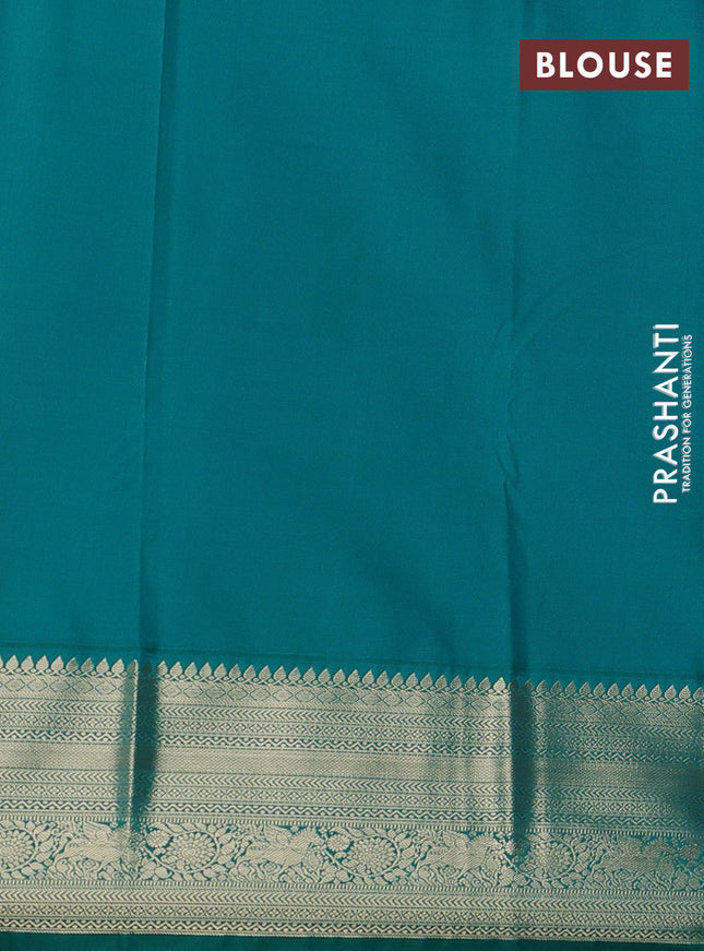 Semi kanchipuram silk saree reddish pink and teal green with allover zari woven buttas and zari woven korvai border