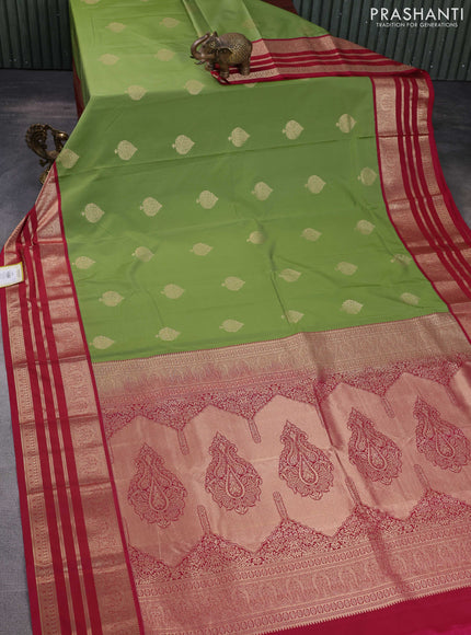 Semi kanchipuram silk saree pastel green and pink with zari woven buttas and rich zari woven korvai border