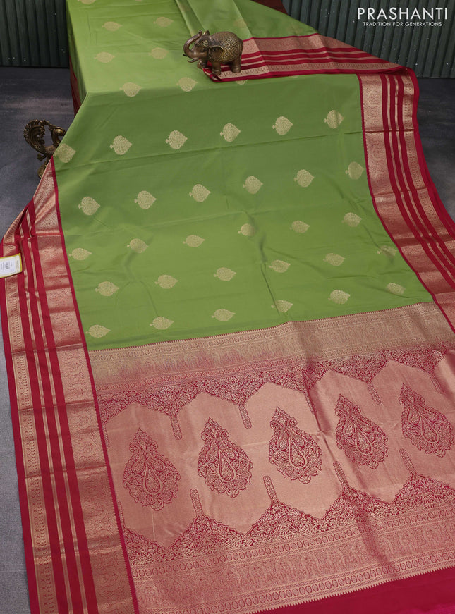 Semi kanchipuram silk saree pastel green and pink with zari woven buttas and rich zari woven korvai border