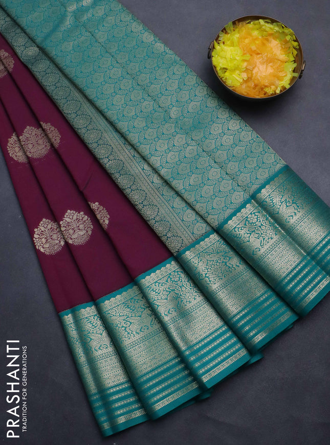 Semi kanchipuram silk saree wine shade and teal green with zari woven buttas and rich zari woven korvai border