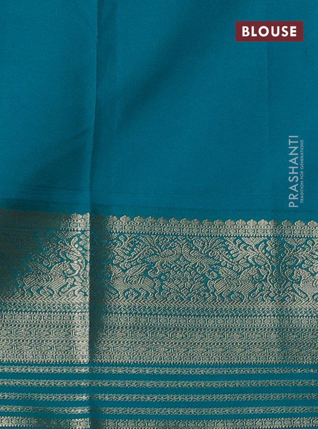 Semi kanchipuram silk saree wine shade and teal green with zari woven buttas and rich zari woven korvai border