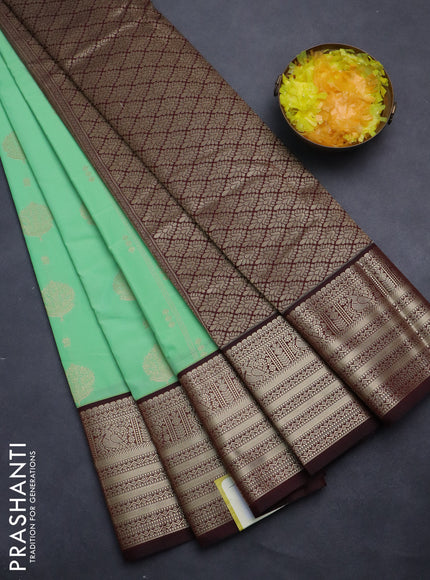 Semi kanchipuram silk saree teal green shade and deep maroon with allover zari weaves & buttas and zari woven korvai border