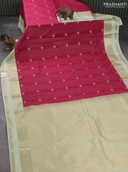 Semi kanchipuram silk saree dark pink and mild pista green with allover zari checks & buttas and rettapet zari woven korvai border