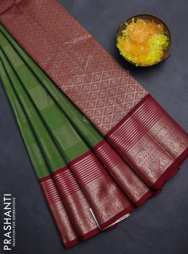 Semi kanchipuram silk saree dual shade of green and maroon with allover zari checks & buttas and rich zari woven korvai border
