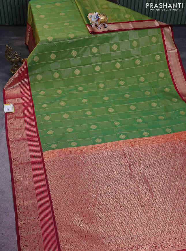 Semi kanchipuram silk saree dual shade of green and maroon with allover zari checks & buttas and rich zari woven korvai border