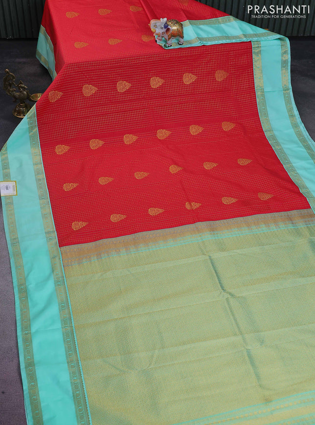 Semi kanchipuram silk saree red shade and teal green shade with allover zari checks & buttas and rettapet zari woven korvai border