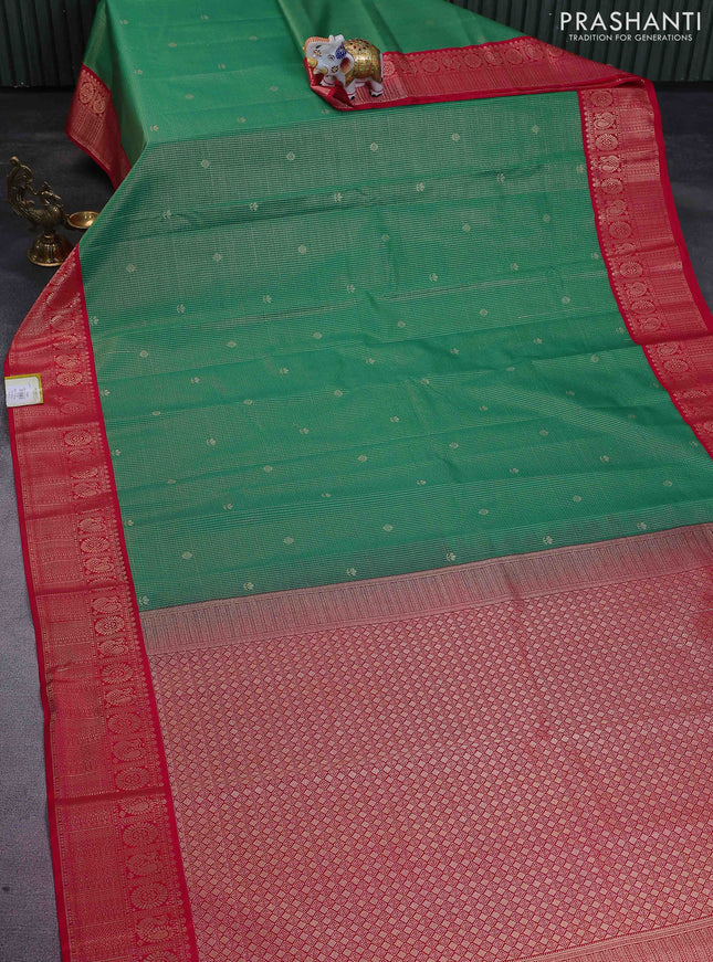 Semi kanchipuram silk saree green and pink with allover zari checks & buttas and zari woven korvai border