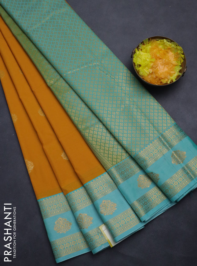 Semi kanchipuram silk saree mustard yellow and teal blue with zari woven buttas and rich zari woven korvai border