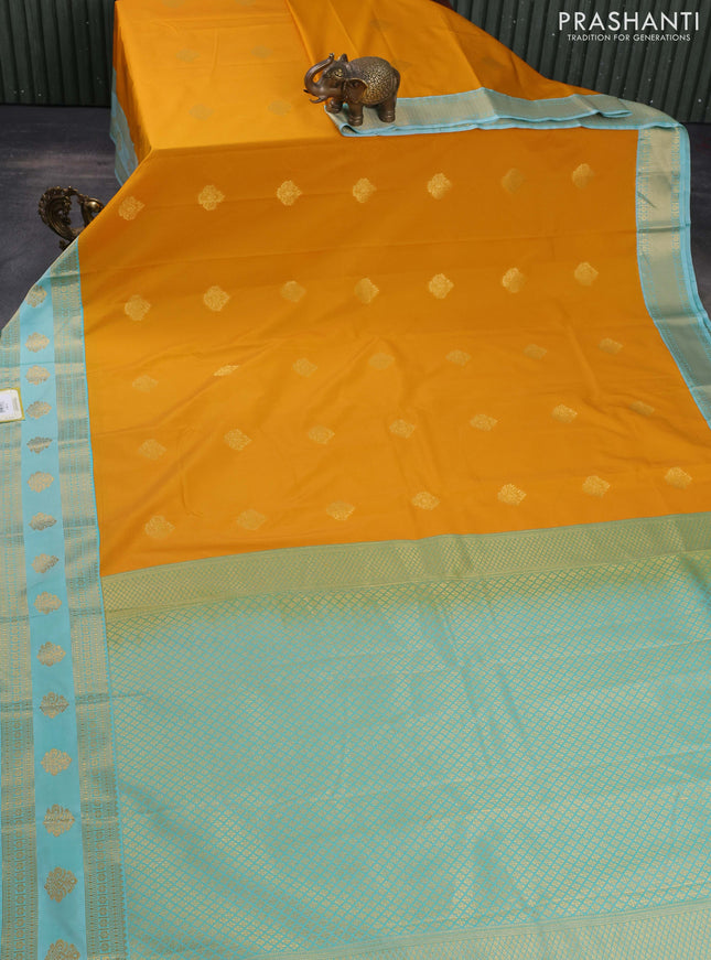 Semi kanchipuram silk saree mustard yellow and teal blue with zari woven buttas and rich zari woven korvai border