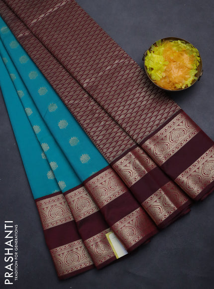 Semi kanchipuram silk saree teal blue and maroon with allover zari woven buttas and long rettapet zari woven korvai border