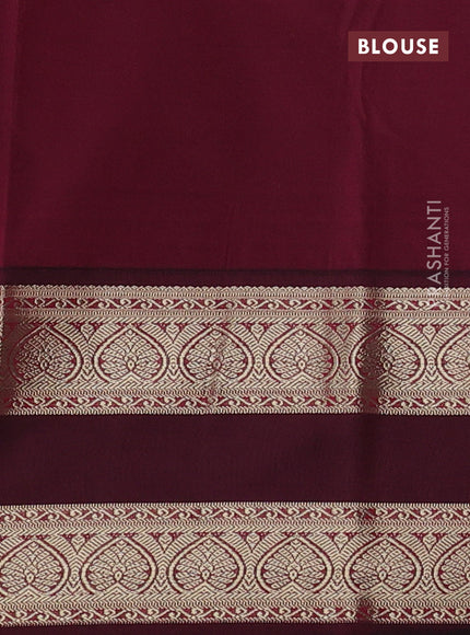 Semi kanchipuram silk saree teal blue and maroon with allover zari woven buttas and long rettapet zari woven korvai border