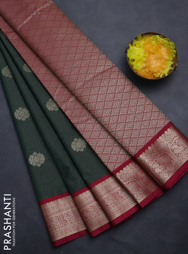 Semi kanchipuram silk saree bottle green and pink with allover zari weaves & buttas and rich zari woven korvai border