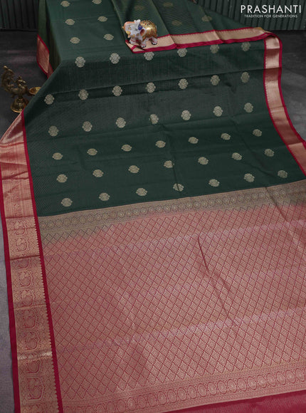 Semi kanchipuram silk saree bottle green and pink with allover zari weaves & buttas and rich zari woven korvai border