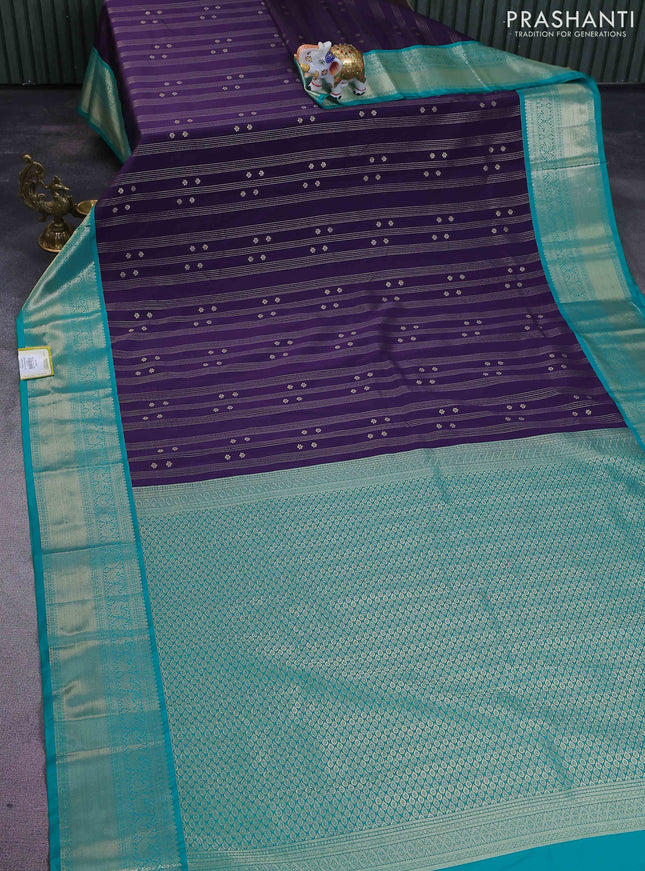 Semi kanchipuram silk saree jamun shade and teal green with allover zari weaves & buttas and rich zari woven korvai border