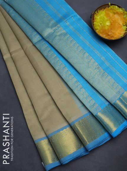 Silk cotton saree beige and light blue with allover vairaosi pattern and zari woven border
