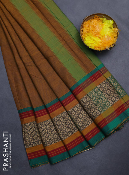 Narayanpet cotton saree dark mustard and green with plain body and thread woven border