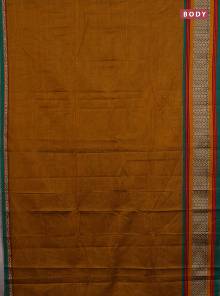 Narayanpet cotton saree dark mustard and green with plain body and thread woven border