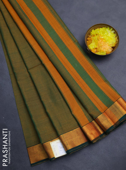 Narayanpet cotton saree dual shade of greenish mustard and green with plain body and zari woven border