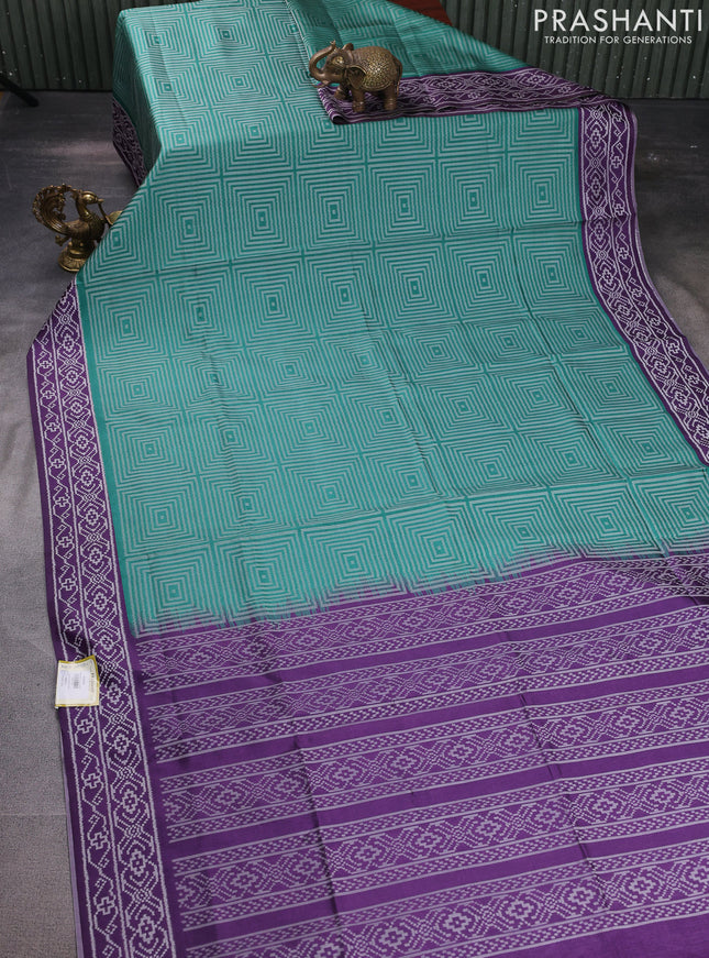 Sambalpuri semi silk saree teal green and violet with allover geometric ikat weaves and thread woven border